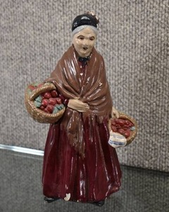 lot 1003 image: Chalkware Fruit Seller Woman  8 x 4 x 3