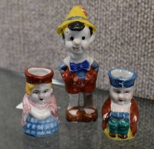 lot 1017 image: Vintage Lot of 3 Mini Toby Jugs and Pinocchio Figure  Walt Disney Prod.   Made in Occupied Japan  4 and 2