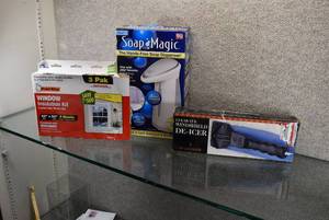 lot 3033 image: Lot of 3 Heated Windshield Scraper, Window Insulation Kit and Hands-Free Soap Dispenser  McGregor, Frost King