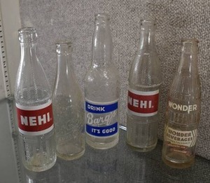 lot 3052 image: Lot of 5 Glass Soda Bottles  Nehi, Barqs, Wonder Beverages, Dr. Pepper