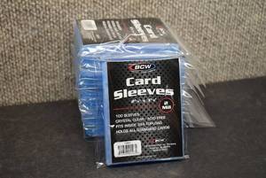 lot 9901 image: Lot of 10 Sealed 100 Count Packs of BCW Trading Card Protective Sleeves - 1,000 Total - New in Package