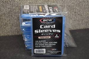 lot 9902 image: Lot of 10 Sealed 100 Count Packs of BCW THICK Trading Card Protective Sleeves - 1,000 Total - New in Package