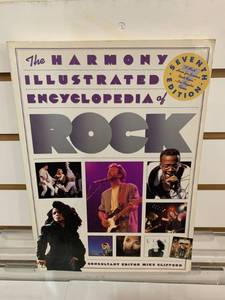 lot 6135 image: The Harmony Illustrated Encyclopedia of Rock  7th Edition