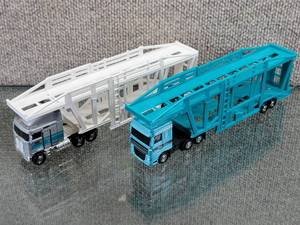 lot 3069 image: Lot of 2 Matchbox Kenworth K100 Semi-Trucks With Car Transporter Trailers