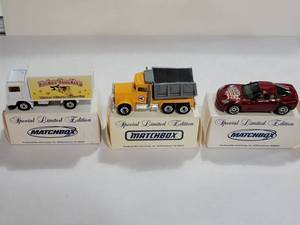 lot 3084 image: Lot of 3 Matchbox Cars  1981 Peterbilt Dump Truck, 2003 Chevrolet Corvette (With Matchbox 2006 West East Collector Show Sticker), & A 1981 Volvo Truck