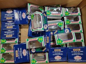 lot 3105 image: Large Lot of Assorted Empty Matchbox MLB 1994 Limited Edition Car Boxes