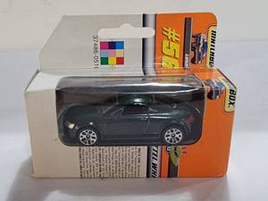 lot 3127 image: Matchbox Diecast Green Sedan In Misprinted Box  Sealed NIP