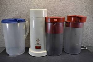 lot 6022 image: Lot of 4 Iced Tea Pot and 3 Plastic Pitchers  Mr. Coffee