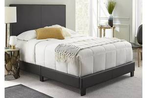 lot 9083 image: ACCENT FURNITURE PADDED PLATFORM BED BLACK MATTRESS NOT INCLUDED