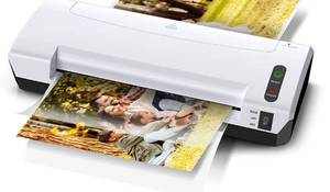 lot 20024 image: LAMINATOR WITH 5 FILM ROLLS