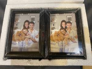 lot 39012 image: 12 BLACK MINI 10 X 15 PHOTO FRAMES