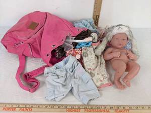 lot 360 image: Baby Doll and Clothes