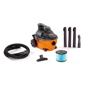 lot 16518 image: RIDGID 4 Gallon 5.0-Peak HP Portable WetDry Shop Vacuum with Fine Dust Filter, Hose and Accessories, OrangesPeaches