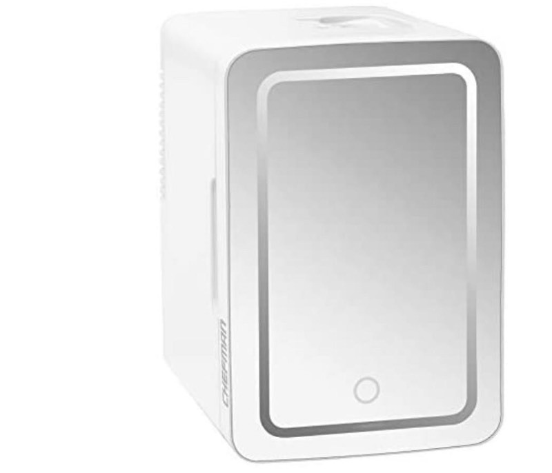 lot 8865 image: Chefman Mirrored Beauty Fridge With LED Lighting, Portable White Mini Refrigerator Skin Care, Makeup Storage, Chill Cosmetics & Face Masks, Small For Desktop Or Travel, Cool & Heat, 6 Liter Capacity (front mirror damaged)
