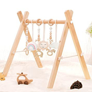 lot 41750 image: Wooden Baby Gym with 4 Baby Sensory Toys Foldable Baby Play Activity Gym Frame Hanging Bar Newborn Gift - may not be exact stock photo