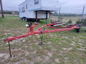 lot 3702 image: Four Winns Red Boat Trailer