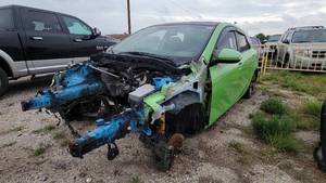 lot 3715 image: 2011 Mazda 3-Speed, Green - PARTS ONLY