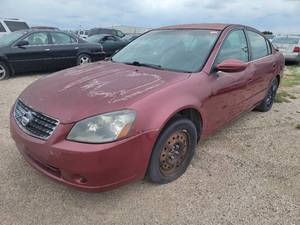 lot 3700 image: Red Nissan