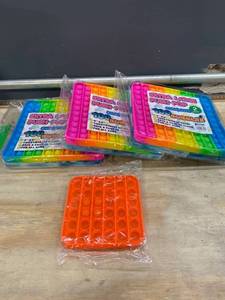 lot 14974 image: (Lot of 7) 6 8�x8� Extra Large Push Pip Silicone Fidget- 1 5x5 Pop Fidget