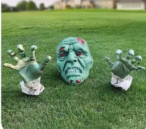 lot 14977 image: Decorations -Realistic Zombie Face and Arms Lawn Stakes - Green Skeleton