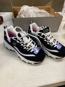 lot 12253 image: Skechers black and white memory foam sneakers size 6.5