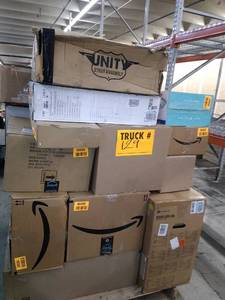 lot 129 image: Miscellaneous Pallet. Ultra Portable Fire Pit, Games & Toys, Unit Strut Assembly, Snuggle Nest Portable infant sleeper, 5000D Air Flow Mid-Tower PC Case & More (SOLD AS IS)