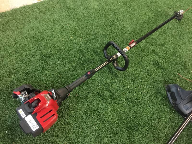 lot 1380 image: Craftsman 25cc 2-Cycle Straight Shaft Weedwacker Gas Trimmer