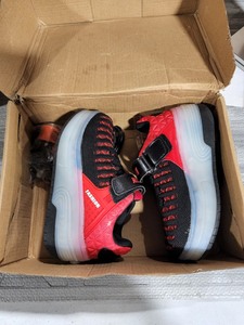 lot 3604 image: Kids Red Heely Style Shoes