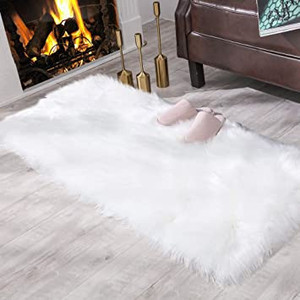 lot 2547 image: Carvapet Fluffy Shaggy Soft Faux Sheepskin Fur Area Rugs Floor Mat Chair Sofa Cover Beside Carpet for Bedroom Living Room, 2ft x 3ft, White