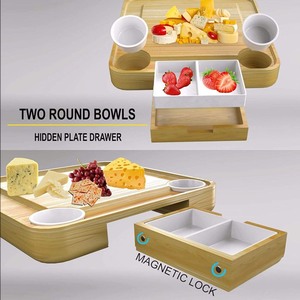 lot 2638 image: iBambooMart Cheese Board and Knife Set, Wooden Charcuterie, Bamboo Platter & Serving Meat Tray wSlide-Out Drawers, 4 Knife, 4 fork, Gifts for Mothers Day, Birthday, Housewarming, Wedding