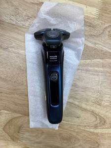 lot 1601 image: Philips Norelco Shaver 7700, Rechargeable Wet & Dry Electric Shaver with SenseIQ Technology, Quick Clean Pod, Charging Stand and Pop-up Trimmer, S778285