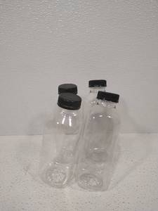 lot 6883 image: 4 plastic bottles