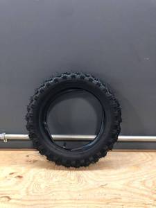 lot 17550 image: 2.5-10 Off-Road Tire and Inner Tube Set - Dirt Bike Tire with 10-Inch Rim and 2.52.75-10 Dirt Bike Inner Tube Replacement Compatible with Honda CRF50XR50, Suzuki DRZ70JR50, and Yamaha PW50