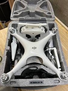 lot 1684 image: DJI Phantom 4  Professional Drone, Hobby RC Quadcopter & Multirotor, White-   No batteryCharger- As Shown