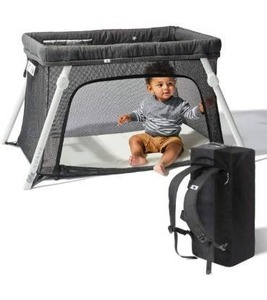 lot 100602 image: Lotus Travel Crib - Backpack Portable, Lightweight, Easy to Pack Play-Yard with Comfortable Mattress - Certified Baby Safe