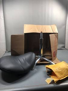 lot 100759 image: Backless saddle seat roller chair