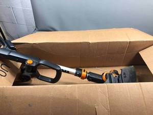 lot 100770 image: used worx weed eater