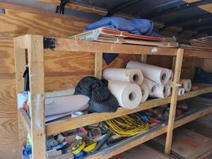 lot 12849 image: Contents of Shelves (Moving Boxes  Wrap  Tools  Blankets)
