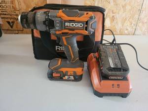 lot 13596 image: Ridgid Drill with Battery and Charger