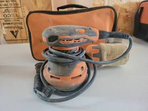 lot 13597 image: Ridgid Palm Sander and Bag