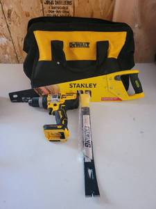 lot 13601 image: Dewalt Tool Bag with Stanley Hamd Saw  Crow Bar  Dewalt Drill ( No Battery)