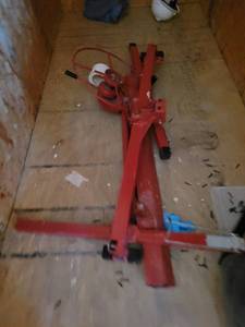 lot 13647 image: Hand Crank Portable Jack on Casters