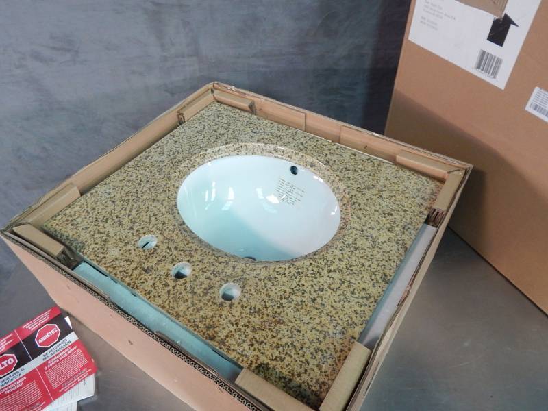 lot 2584 image: 25 Vanity Top With Sink and Backsplash