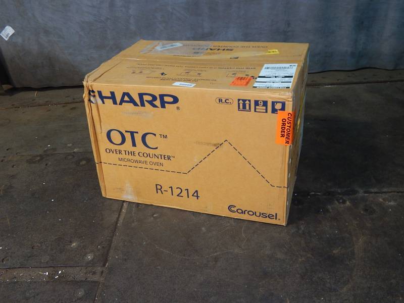 lot 2155 image: Sharp Over The Counter Microwave Oven Factory Sealed
