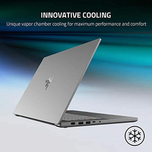 lot 15199 image: Razer Blade 15 Studio Edition Laptop 2020 (Cracked, Has Scratch screen. Powers on, battery went dead. has No power Cord--UNTESTED) (SOLD AS IS)