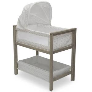 lot 38001 image: Delta Children Farmhouse 2-in-1 Convertible Bassinet with Canopy - Royal Charms