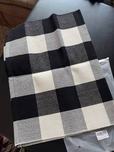 lot 22752 image: Black and White Checkered Rug