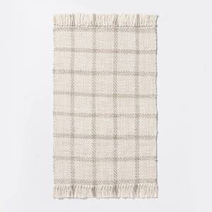 lot 8597 image: 21x32 Woven IndoorOutdoor Rug with Fringe Linen - Threshold designed with Studio McGee