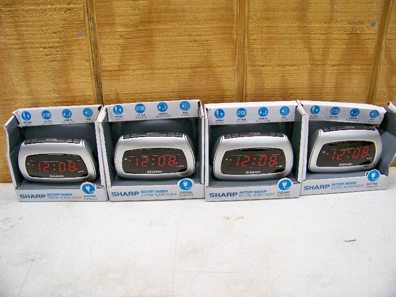 lot 704 image: 4 Sharp Battery Backup Digital Alarm Clocks