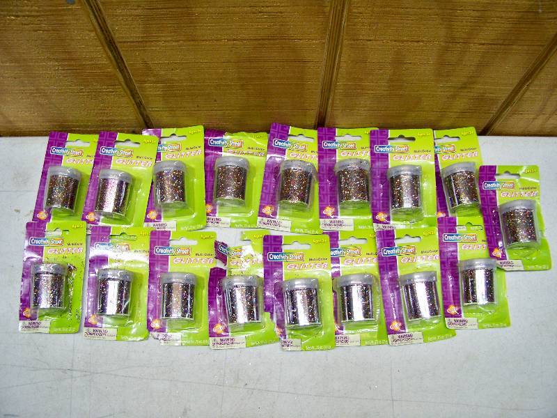 lot 713 image: 17 Jars of Glitter